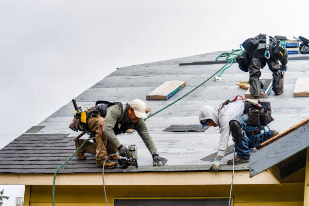 Professional Gutter Installation technician working in Stevinson, CA